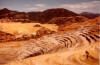 Bingham Canyon open pit mine, Bingham Canyon, Oquirrh Range, outside Salt Lake City, 23 July 1980.  Interesting historical photo. Today the pit walls are much steeper, just short of a failure slope, and the benches aresteeper and more widely-spaced because ore is moved by truck, not railroad cars.