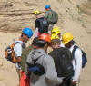 Students consulting with Rudy, Stockton bar project