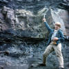 Jack Crelling explaining coking of coal xenoliths in a magmatic sill, Spanish Peaks area, Colorado. It was raining heavily at the time.  XC trip